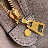 Handle and strap detail of modern structured women's handbag – women's designer-style accessory