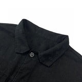 Flat lay presentation of Louis Vuitton luxury clothing with relaxed-fit cut