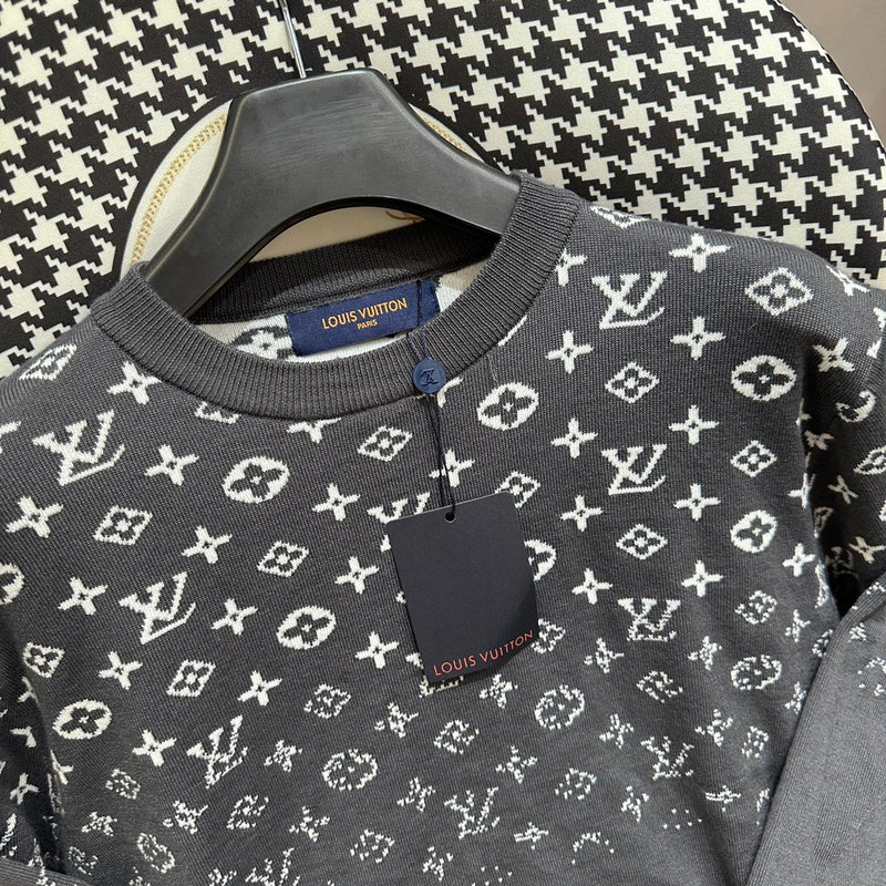 Close-up detail shot of Louis Vuitton luxury clothing with label-forward styling