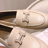 Hermès Grey Bow-Detail Flats - Side Profile View