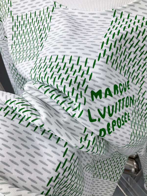 Front view of Louis Vuitton luxury clothing with label-forward styling