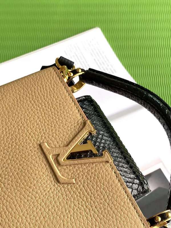 Styled lifestyle shot of signature modern women's handbag – women's luxury handbag