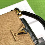 Styled lifestyle shot of signature modern women's handbag – women's luxury handbag