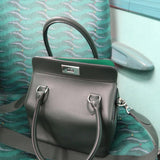 Side view of smart structured handbag