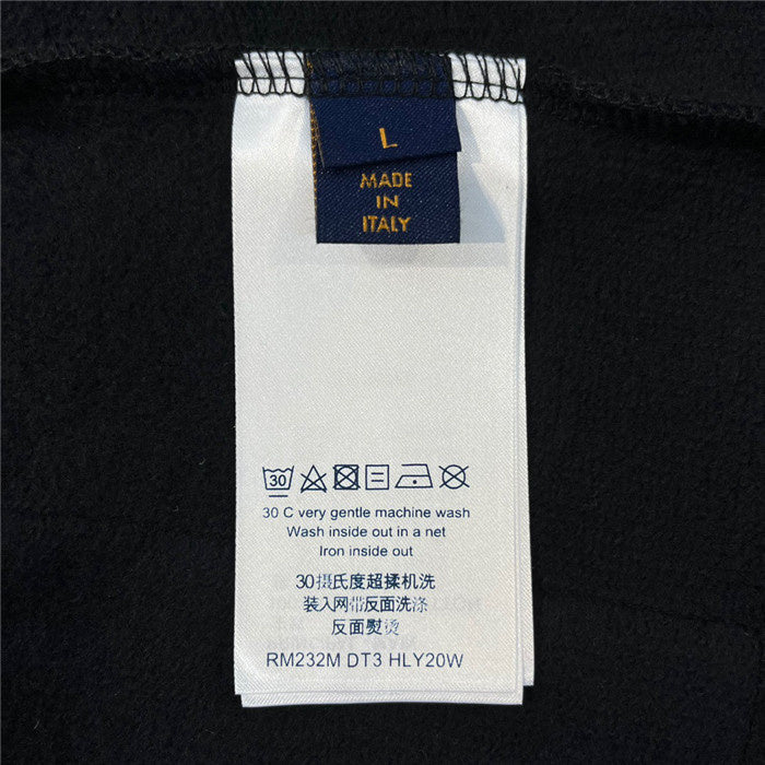 Close-up detail shot of Louis Vuitton cotton t-shirt with runway-inspired design