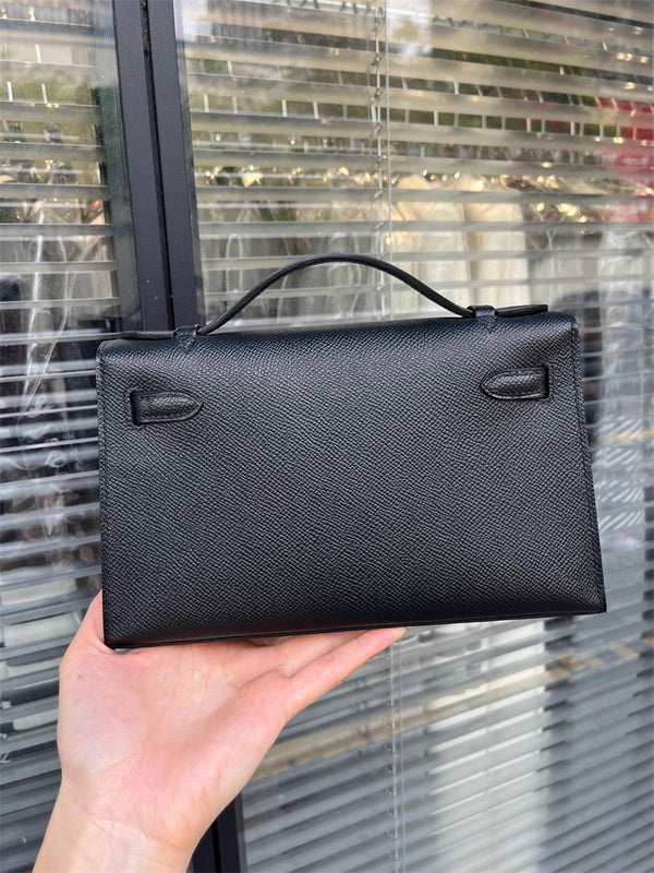 Side view of graceful structured handbag