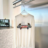 Full styled look of Louis Vuitton luxury clothing with monogram-inspired silhouette