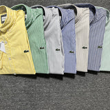 Full styled look of Lacoste luxury clothing with monogram-inspired silhouette