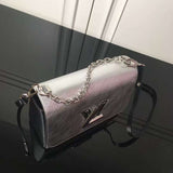 Handle and strap detail of structured everyday-luxe women's handbag – women's everyday handbag