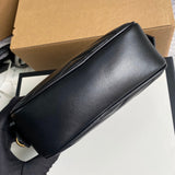 Handle and strap detail of structured signature women's handbag – women's statement bag
