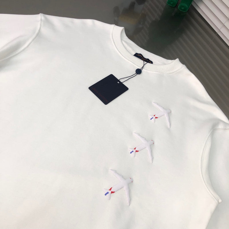 Side profile of Louis Vuitton luxury clothing with monogram-inspired silhouette