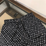 Full styled look of Louis Vuitton cotton t-shirt with runway-inspired design
