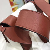 Handle and strap detail of premium modern women's handbag – women's luxury accessory