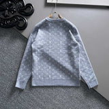 Close-up detail shot of Louis Vuitton luxury clothing with logo-detail design