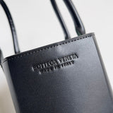 Chic Vegan Leather Handbag - Polished Finish | Women's Everyday Carry Handbag #1580 - styled full view (image 7) of designer-inspired handbag