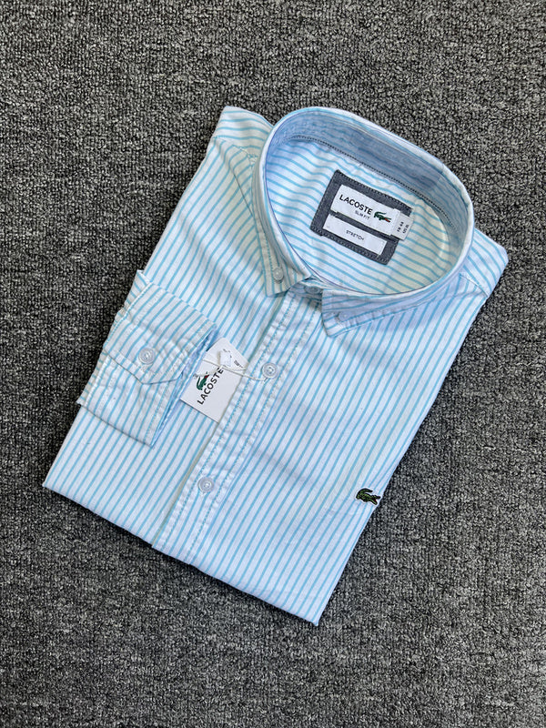 Side profile of Lacoste luxury clothing with logo-detail design