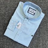 Side profile of Lacoste luxury clothing with logo-detail design