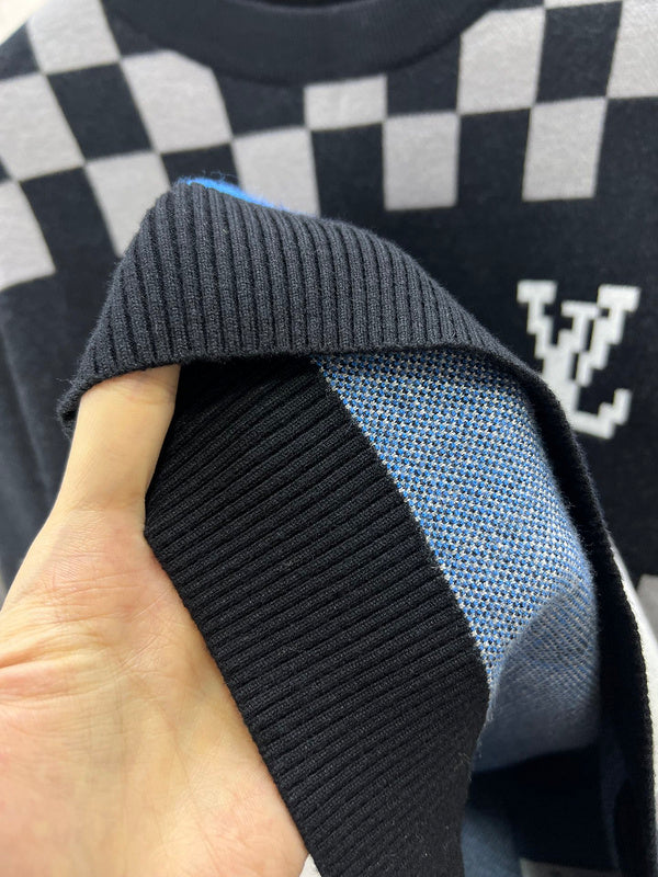 Side profile of Louis Vuitton luxury clothing with logo-detail design