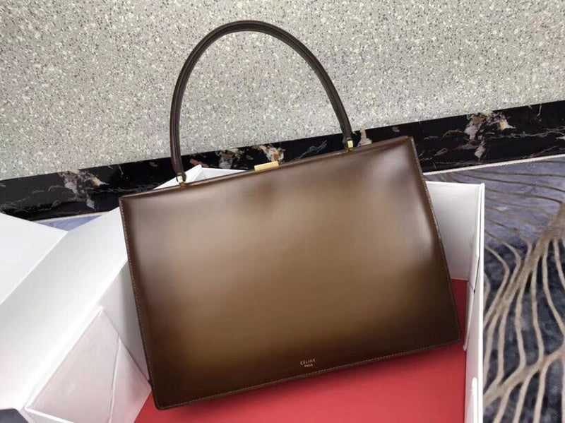 Side profile of everyday-luxe statement women's handbag – women's luxury handbag