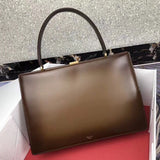 Side profile of everyday-luxe statement women's handbag – women's luxury handbag