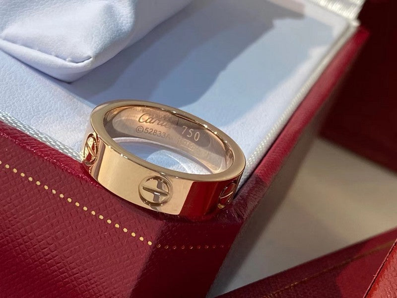 Close-up detail view of Cartier unisex jewelry piece