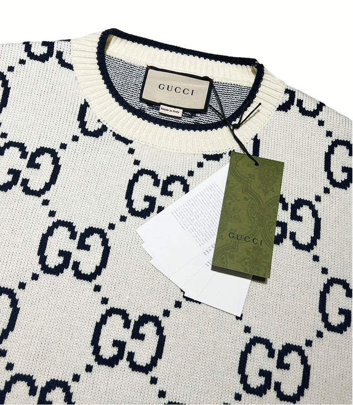 Close-up detail shot of Gucci luxury clothing with relaxed-fit cut