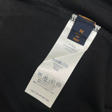 Flat lay presentation of Louis Vuitton cotton t-shirt with monogram-inspired silhouette
