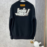 Side profile of Louis Vuitton luxury clothing with logo-detail design