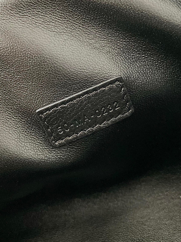 Side profile of elevated refined women's handbag – women's luxury handbag