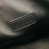 Side profile of elevated refined women's handbag – women's luxury handbag