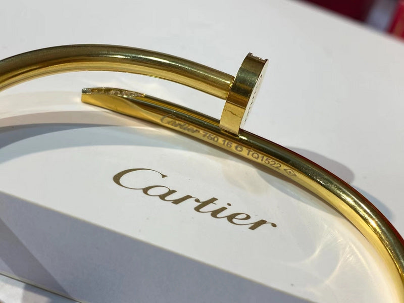 Angled view of Cartier unisex jewelry piece