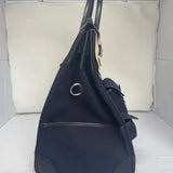 Side view of minimalist structured handbag