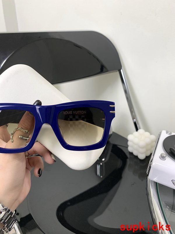 Close-up detail view of Louis Vuitton unisex sunglasses