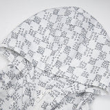 Side profile of Louis Vuitton luxury clothing with monogram-inspired silhouette