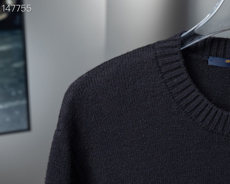 Full styled look of Louis Vuitton luxury clothing with signature branding