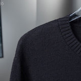 Full styled look of Louis Vuitton luxury clothing with signature branding