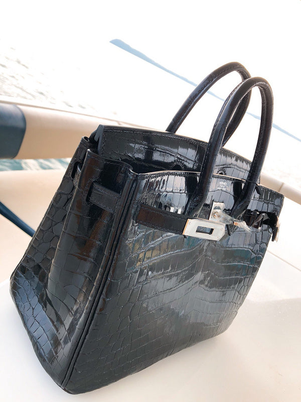 Side view of modernist structured handbag