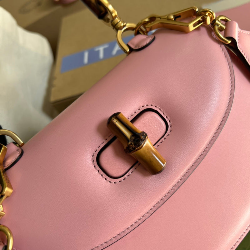 Back view of signature structured women's handbag – women's statement bag