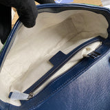 Side profile of refined modern women's handbag – women's luxury accessory