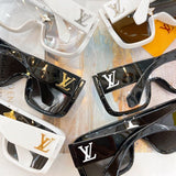 Side view of Louis Vuitton unisex sunglasses