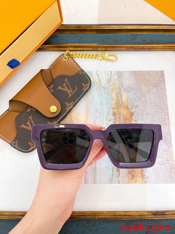 Close-up detail view of Louis Vuitton unisex sunglasses