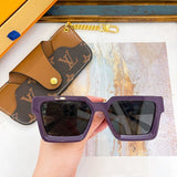 Close-up detail view of Louis Vuitton unisex sunglasses