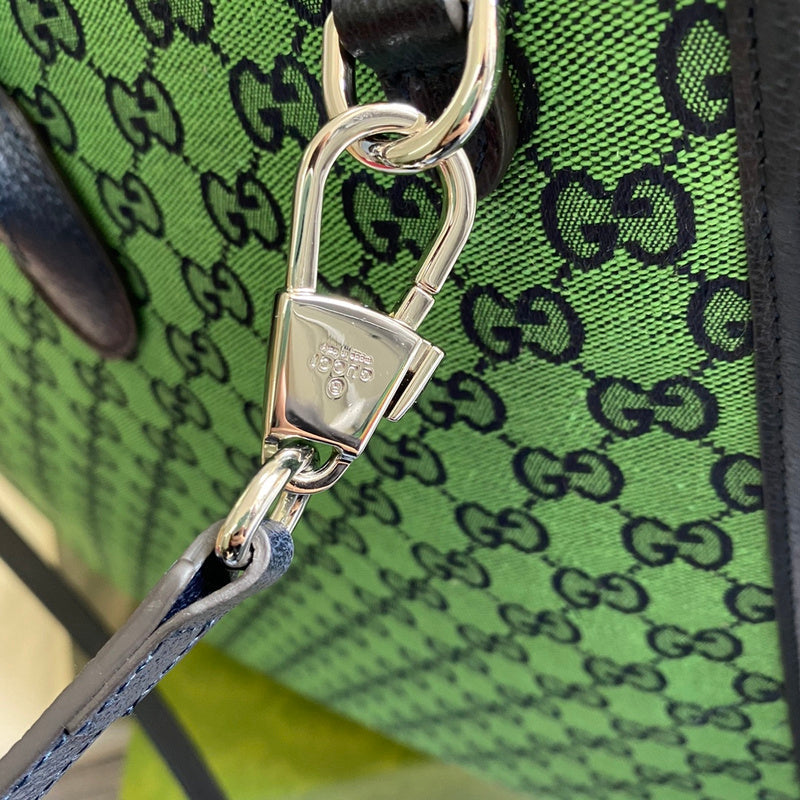 Handle and strap detail of premium signature women's handbag – women's luxury handbag