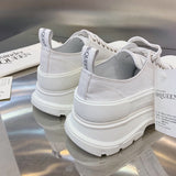 Alexander McQueen Nude Chunky Platform Sneakers - Angled View