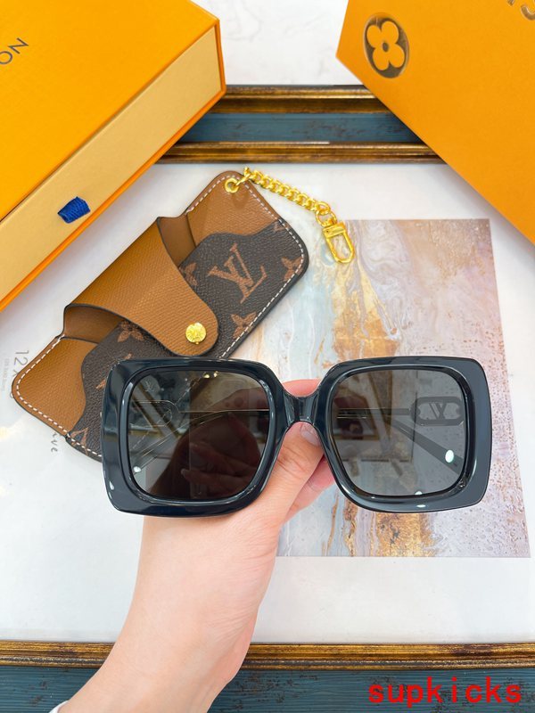 Close-up detail view of Louis Vuitton unisex sunglasses