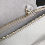 Side profile of everyday-luxe modern women's handbag – women's designer-style accessory