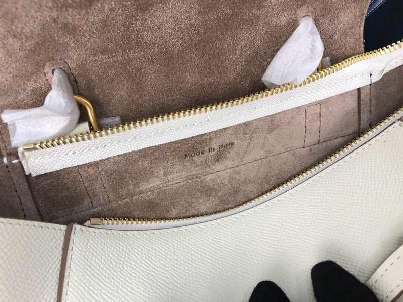 Top view of statement structured women's handbag – women's luxury accessory
