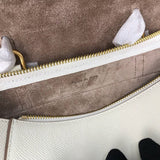 Top view of statement structured women's handbag – women's luxury accessory