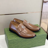 Gucci Designer sneakers in muted earth tones retro runner design front view