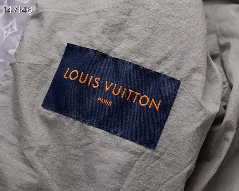Close-up detail shot of Louis Vuitton luxury clothing with tailored silhouette